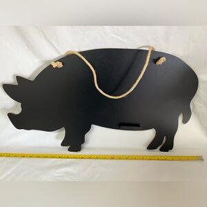 farmhouse-style pig-shaped chalkboard sign with rope to hang on wall